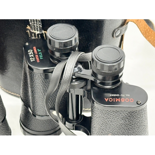 615 - 2 pairs of binoculars with cases.