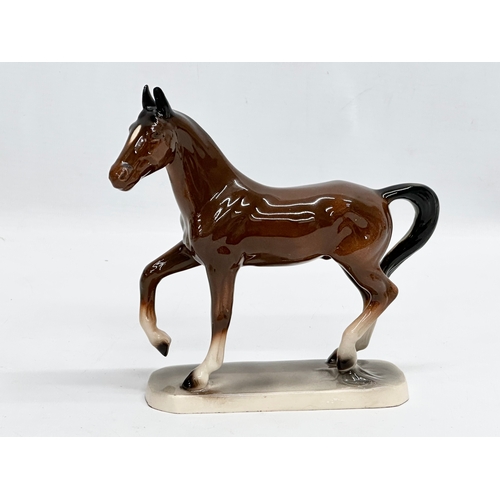 619 - 4 pottery horses. John Beswick, Katzhütte and Hertwig. Largest 20x18cm