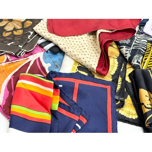 627 - A collection of vintage silk scarves.