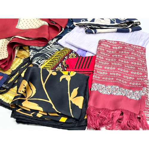 627 - A collection of vintage silk scarves.