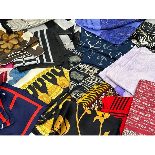 627 - A collection of vintage silk scarves.