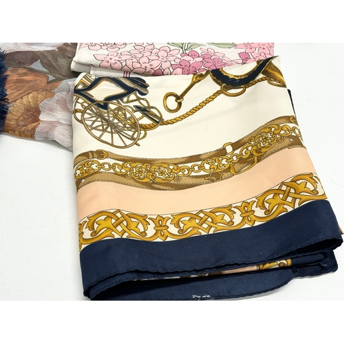 628 - A collection of vintage silk scarves.