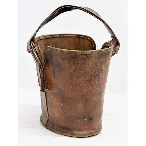 360 - A 1930’s Norris leather bucket bag/carrier. 27x28x24cm