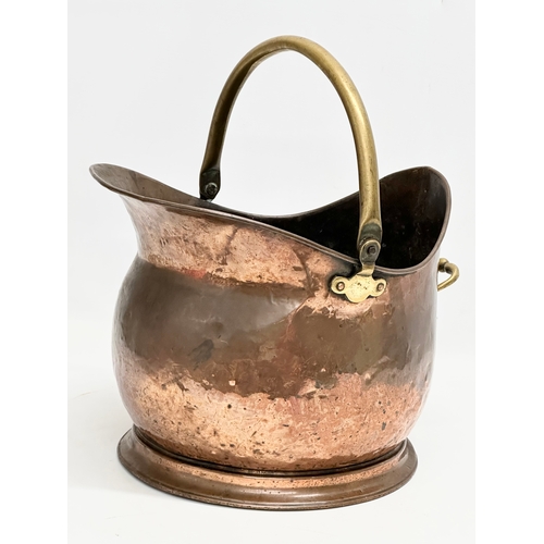 359 - A Late Victorian copper coal scuttle. 28x32cm