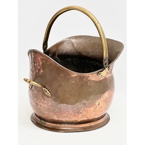 359 - A Late Victorian copper coal scuttle. 28x32cm