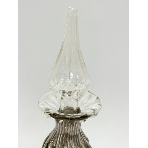 469A - A 19th Century Irish silver and glass scent bottle. 13cm