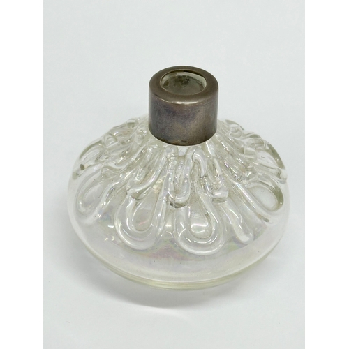 469B - A silver rimmed iridescent glass scent bottle. Birmingham mark. 5.5x5cm