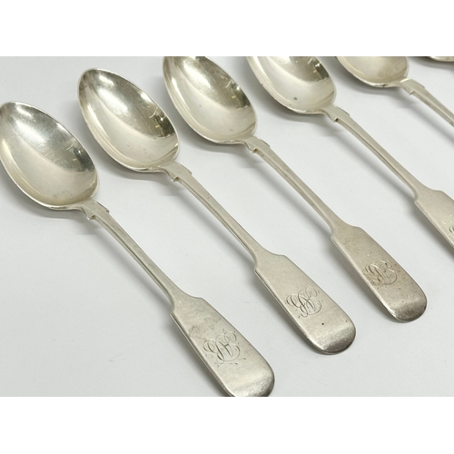 469C - A set of 9 19th Century silver spoons. Exeter 1875. Stamped JW.Co. 220 grams. 15cm