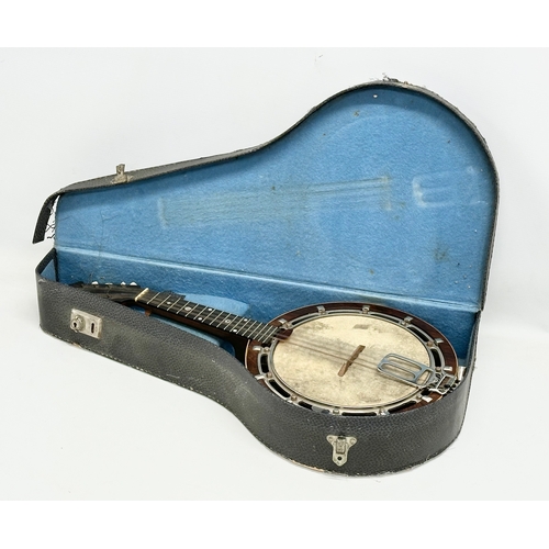 637 - A good quality vintage inlaid rosewood mandolin with case.