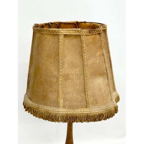 646 - 2 Early 20th Century turned wood table lamps. 47cm