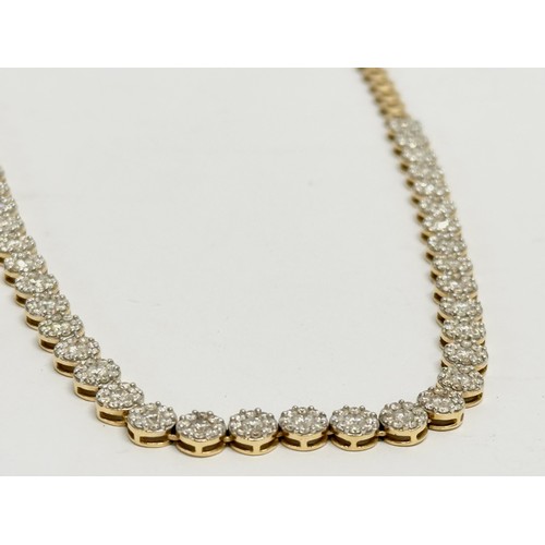 460A - An 18ct gold and diamond collarette necklace. 7.18ct Diamond. 29.1 grams total.