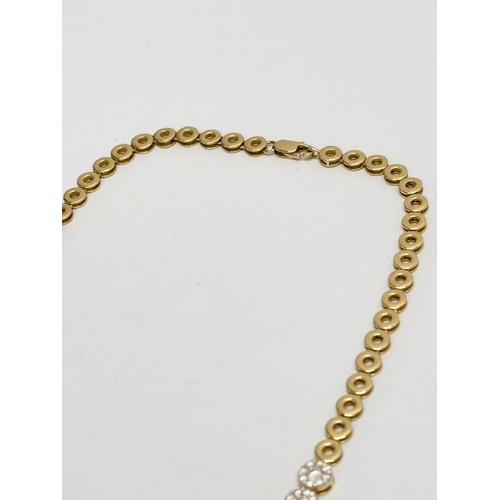 460A - An 18ct gold and diamond collarette necklace. 7.18ct Diamond. 29.1 grams total.