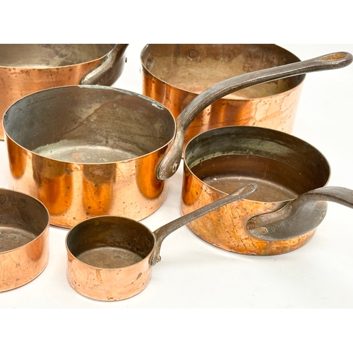 60D - A set of 7 Victorian copper pans. Largest 39x18.5x17cm