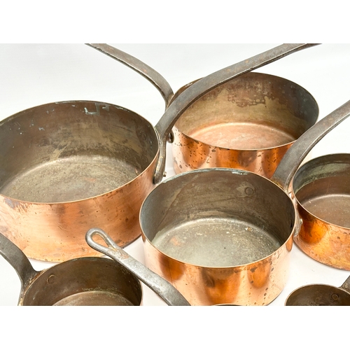 60D - A set of 7 Victorian copper pans. Largest 39x18.5x17cm