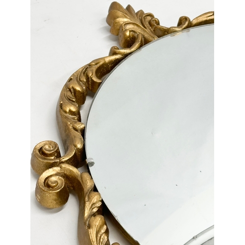 360E - A vintage Peerart Products gilt framed convex mirror. 37x42cm