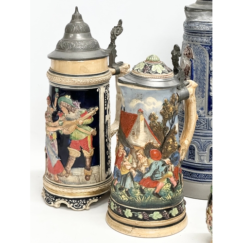 643 - A collection of large Late 19th and Early 20th Century German beer steins. A large Westerwald salt g... 