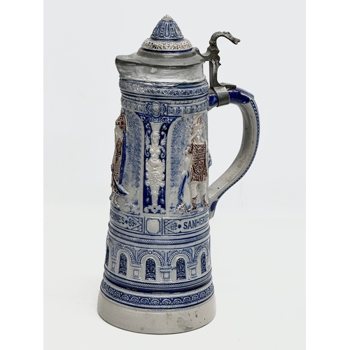 643 - A collection of large Late 19th and Early 20th Century German beer steins. A large Westerwald salt g... 