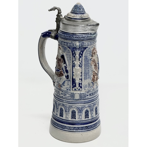 643 - A collection of large Late 19th and Early 20th Century German beer steins. A large Westerwald salt g... 