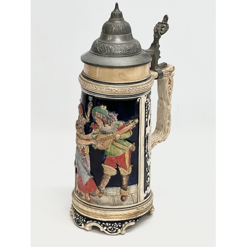 643 - A collection of large Late 19th and Early 20th Century German beer steins. A large Westerwald salt g... 