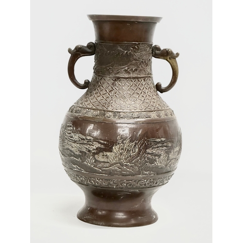 60F - A Late 19th Century Japanese bronze vase. Meiji Period. Circa 1880-1900. 18x30cm