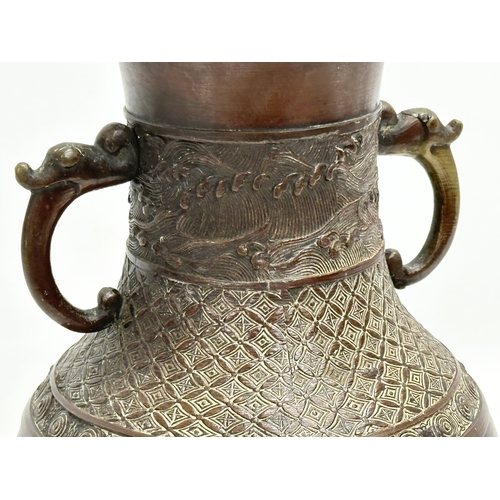 60F - A Late 19th Century Japanese bronze vase. Meiji Period. Circa 1880-1900. 18x30cm