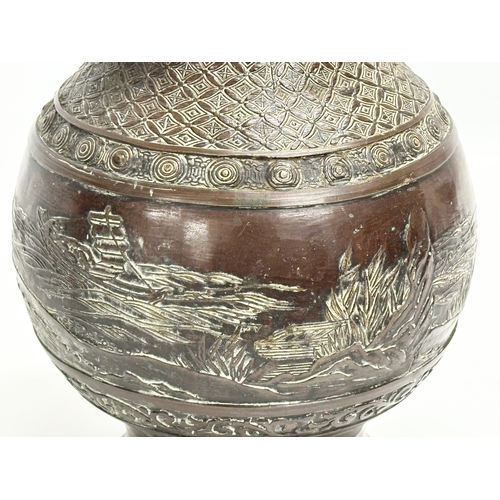 60F - A Late 19th Century Japanese bronze vase. Meiji Period. Circa 1880-1900. 18x30cm