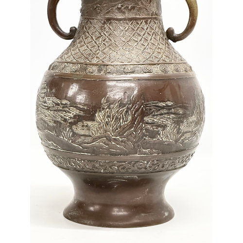 60F - A Late 19th Century Japanese bronze vase. Meiji Period. Circa 1880-1900. 18x30cm