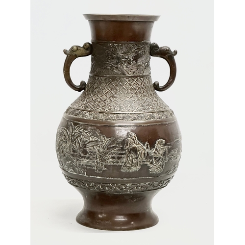 60F - A Late 19th Century Japanese bronze vase. Meiji Period. Circa 1880-1900. 18x30cm