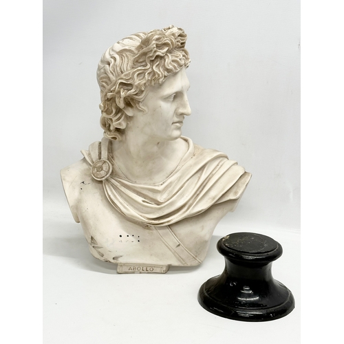 650 - A large heavy resin bust of Apollo on stand. 36x55cm