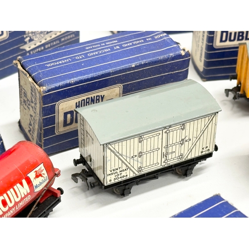 659 - A collection of Hornby Dublo trains, carriages and tenners etc. with original boxes