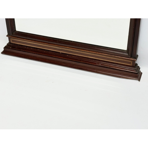 360L - A vintage inlaid mahogany framed bevelled mirror. 60x81.5cm