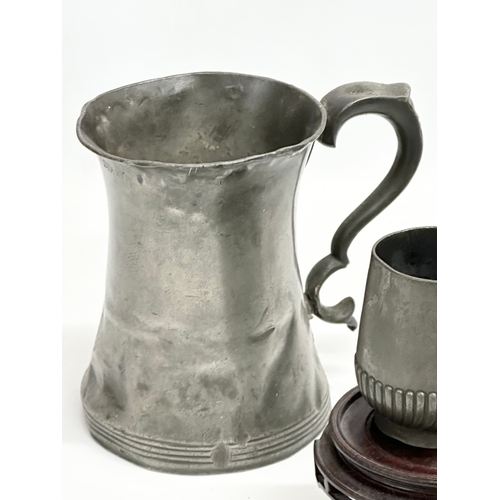 725 - A job lot. A Late 19th Century Hyacinth vase. A large Victorian pewter tankard and other. A pair of ... 