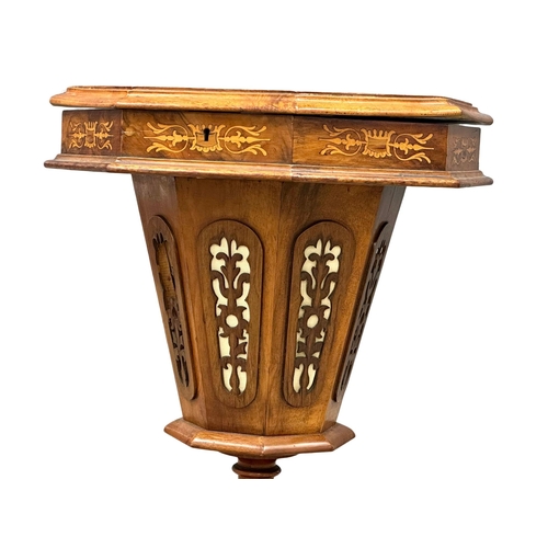 824 - A Victorian inlaid walnut trumpet work table. 42x42x73cm.