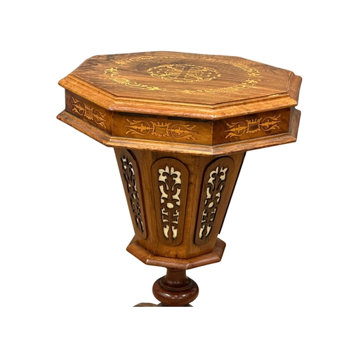 824 - A Victorian inlaid walnut trumpet work table. 42x42x73cm.