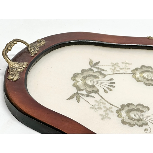 742 - A vintage mahogany framed tray with brass mounts and embroidered panel. 45x30cm