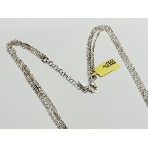 539S - A silver chain necklace. 61cm open.