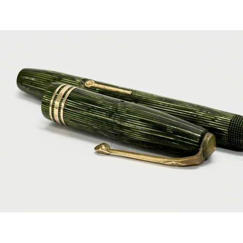 470E - A 14k gold nip fountain pen by Conway Stewart.