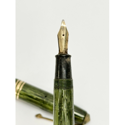 470E - A 14k gold nip fountain pen by Conway Stewart.