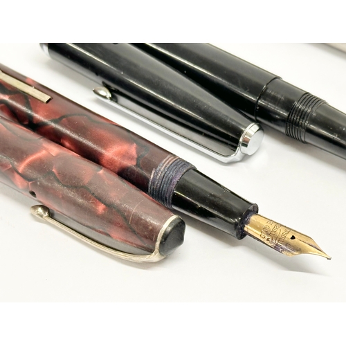 470F - A 14k gold nib fountain pen by Conway Stewart, with 2 other pens.