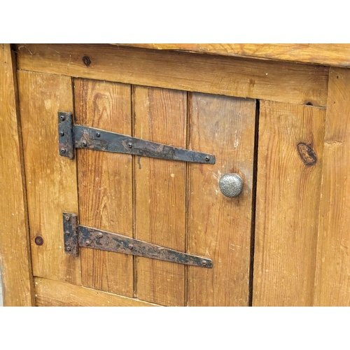 1000 - A vintage rustic pine cabinet. 76x38.5x81.5cm