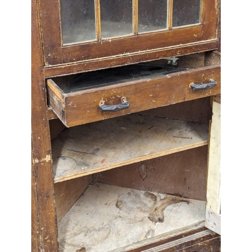 1006 - A Late George III pine corner cabinet with original paintwork, astragal glazed door, and drawer. 91x... 