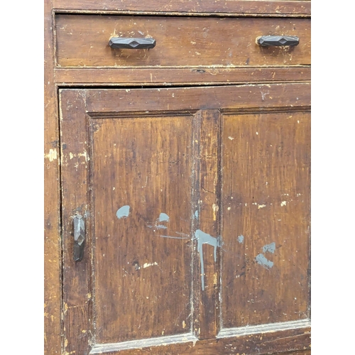 1006 - A Late George III pine corner cabinet with original paintwork, astragal glazed door, and drawer. 91x... 