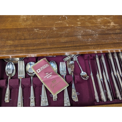 1007 - A vintage Georgian style cutlery chest with Oneida cutlery. 49x36x79cm