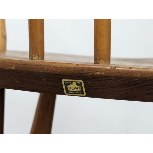 805 - An Ercol Blonde elm and beech Mid Century armchair. Model 182.