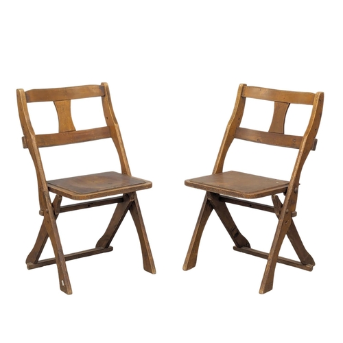 815 - A set of 4 Early 20th Century church folding chairs by The Drifter.