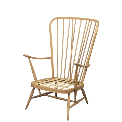 820 - An Ercol Blonde Mid Century elm and beech armchair. Model 914.