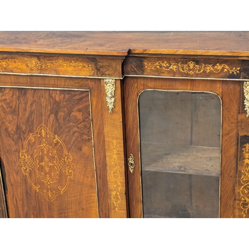 839 - A large Victorian inlaid walnut credenza with brass ormolu mounts. 176x37x106cm