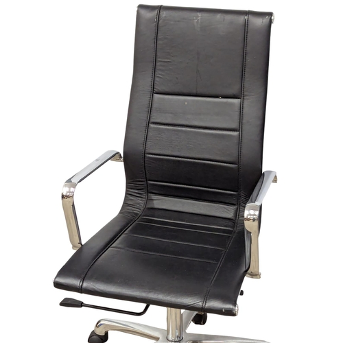 900 - A Eames style swivel desk chair.