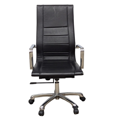 900 - A Eames style swivel desk chair.