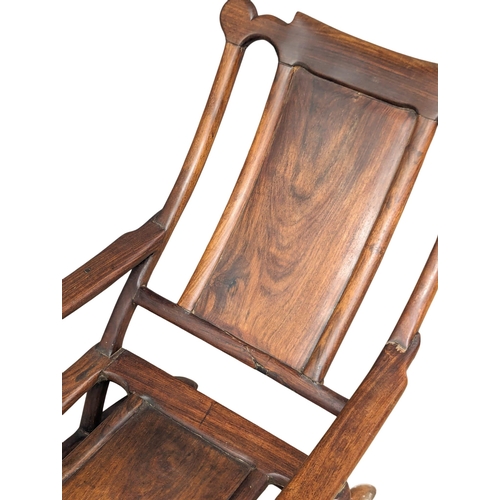 902 - An Early 20th Century Chinese padauk armchair.